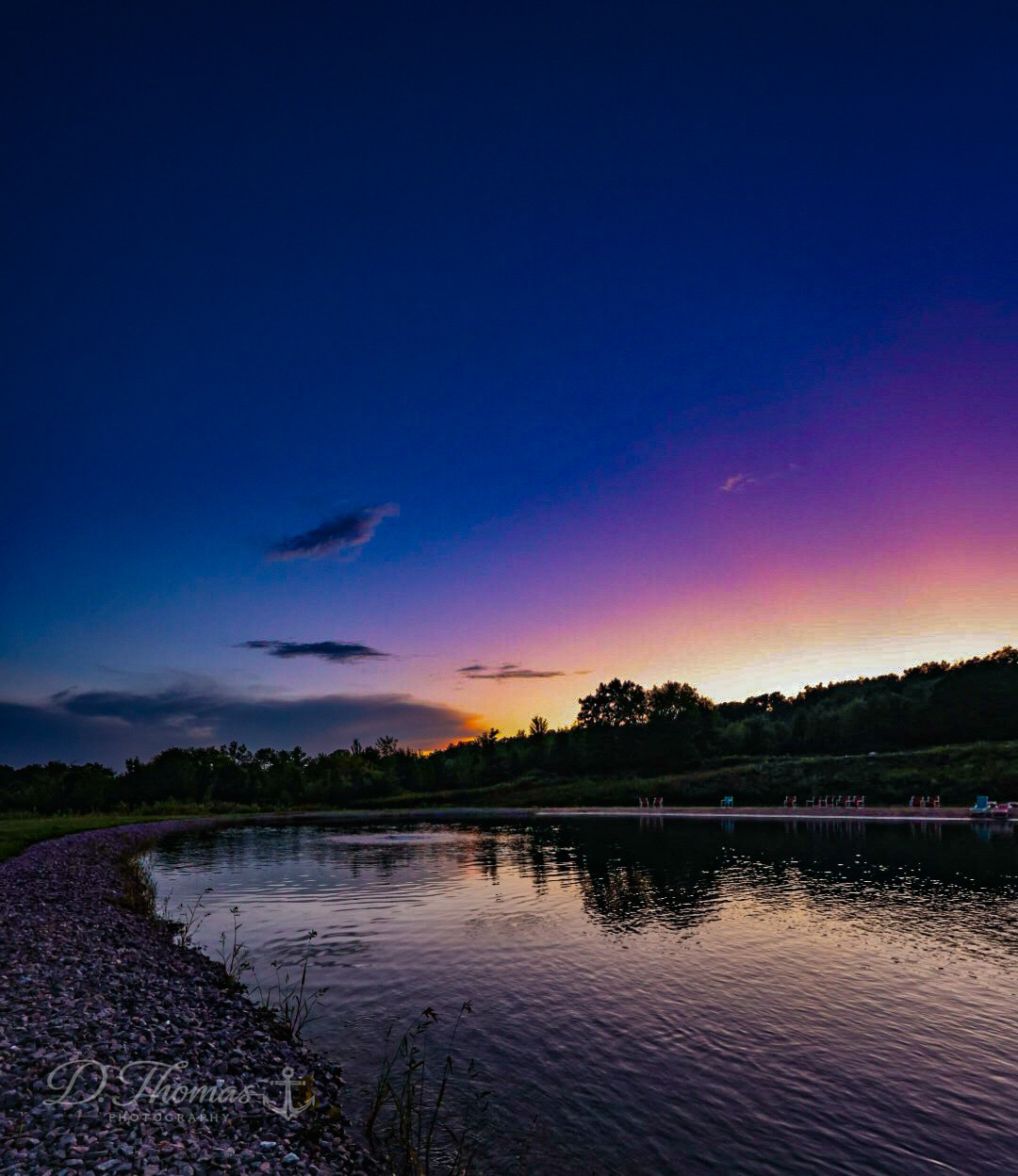Colorful sunset reflected across a lake